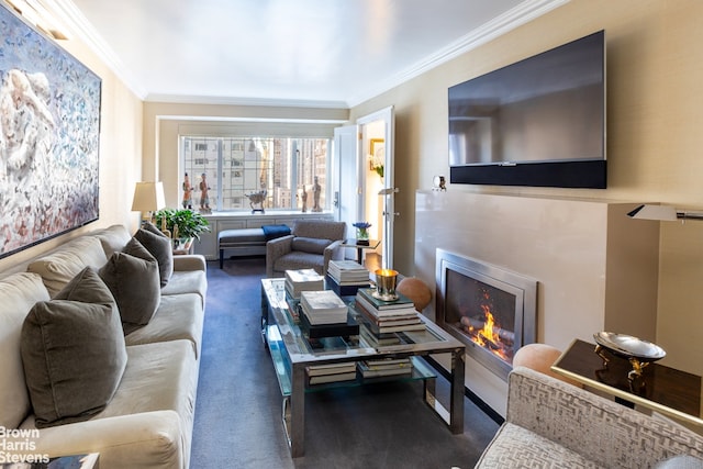 living area with crown molding, dark carpet, and a lit fireplace