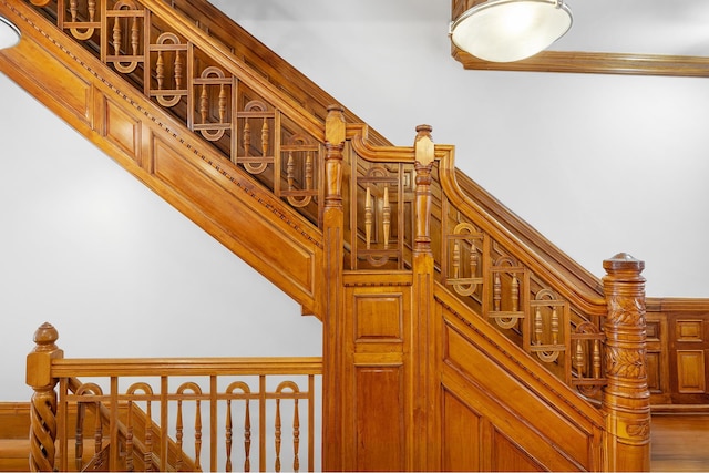 stairs with wood finished floors