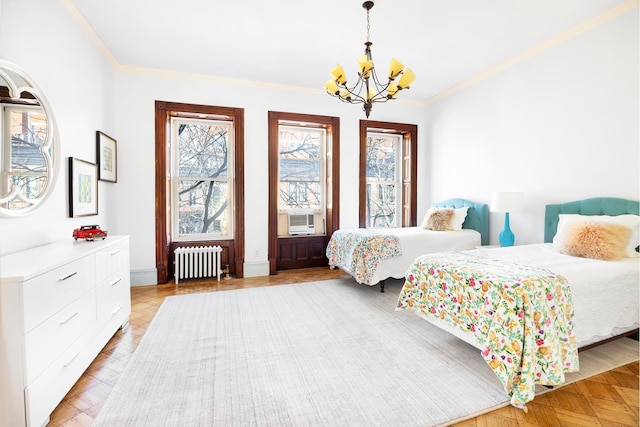 bedroom featuring radiator, an inviting chandelier, baseboards, and ornamental molding