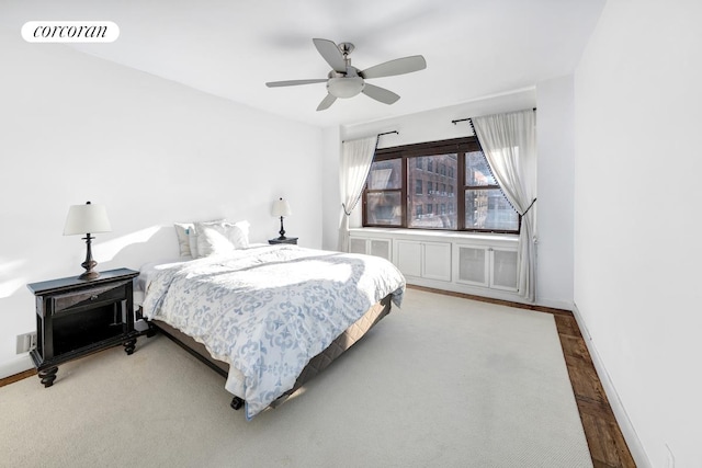 405 E 63rd St Unit 10J, New York City, NY 10065 - bedroom featuring baseboards, ceiling fan, and wood finished floors