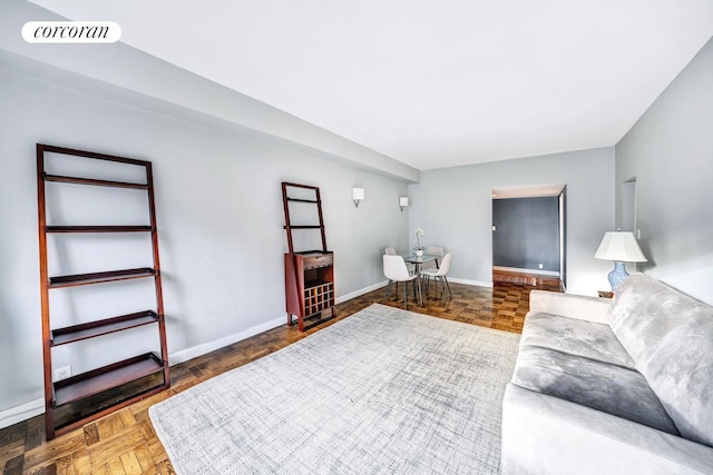 405 E 63rd St Unit 10J, New York City, NY 10065 - living room with baseboards