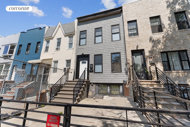 townhome / multi-family property with a residential view