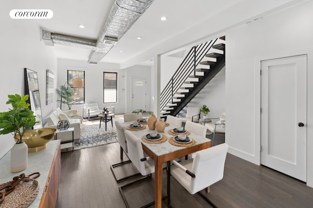 dining space featuring recessed lighting, dark wood finished floors, baseboards, and stairway