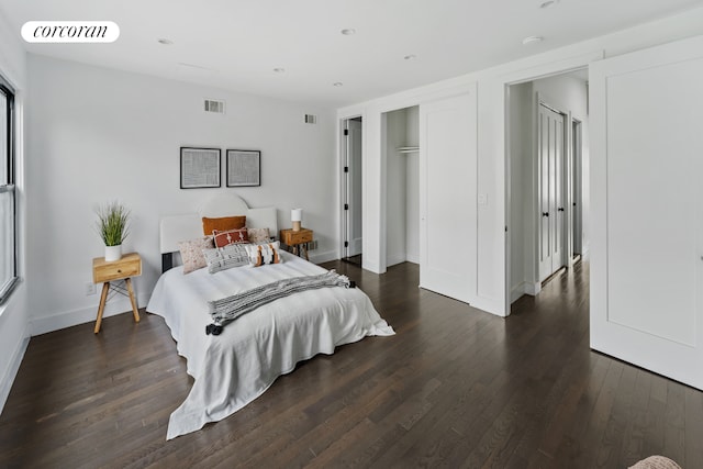 bedroom featuring recessed lighting, baseboards, visible vents, and dark wood-type flooring