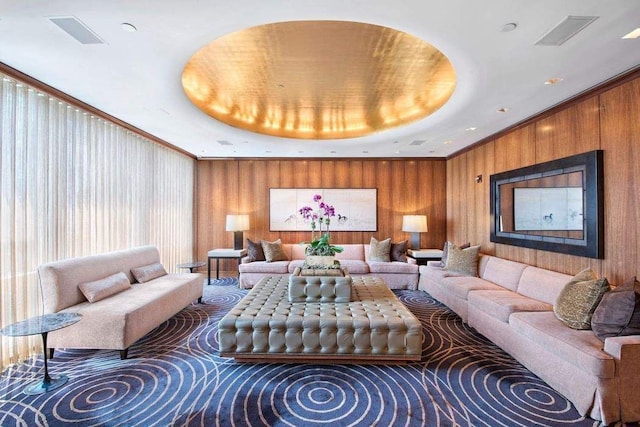 lobby featuring wooden walls and crown molding