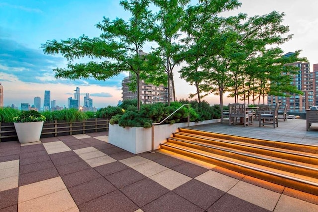 view of patio / terrace featuring a city view