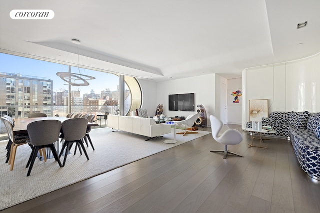 520 W 28th St Unit 29, New York City, NY 10001 - living area featuring wood finished floors and floor to ceiling windows