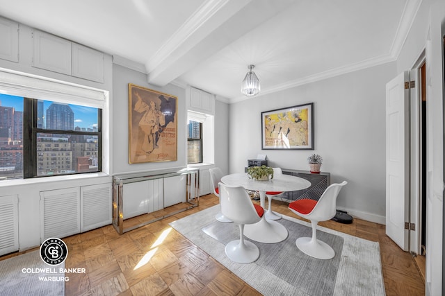 dining area with a city view, crown molding, beamed ceiling, and baseboards