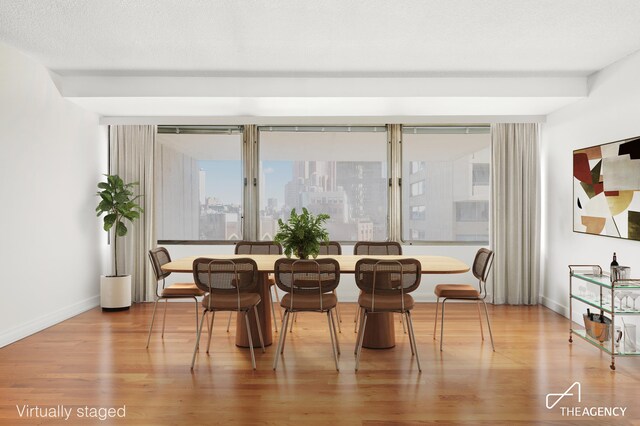170 Park Row Unit 7C, New York City, NY 10038 - dining space featuring wood finished floors and baseboards