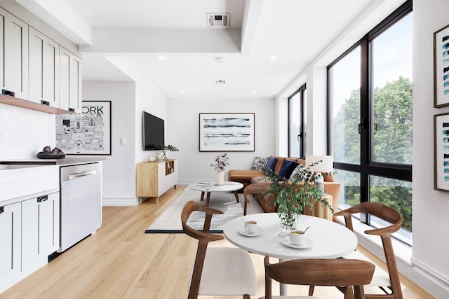1255 Bushwick Ave Unit 3E, New York City, NY 11207 - dining room with light wood finished floors, recessed lighting, and baseboards