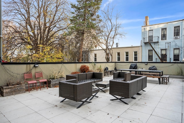 view of patio with an outdoor hangout area and cooling unit