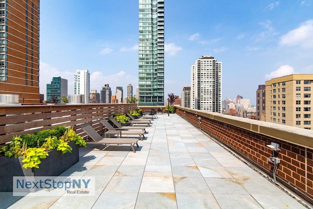 view of patio / terrace featuring a view of city