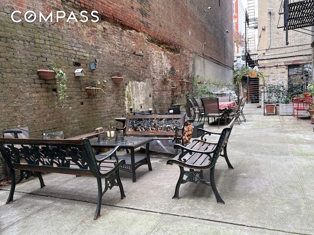 view of patio with outdoor dining area