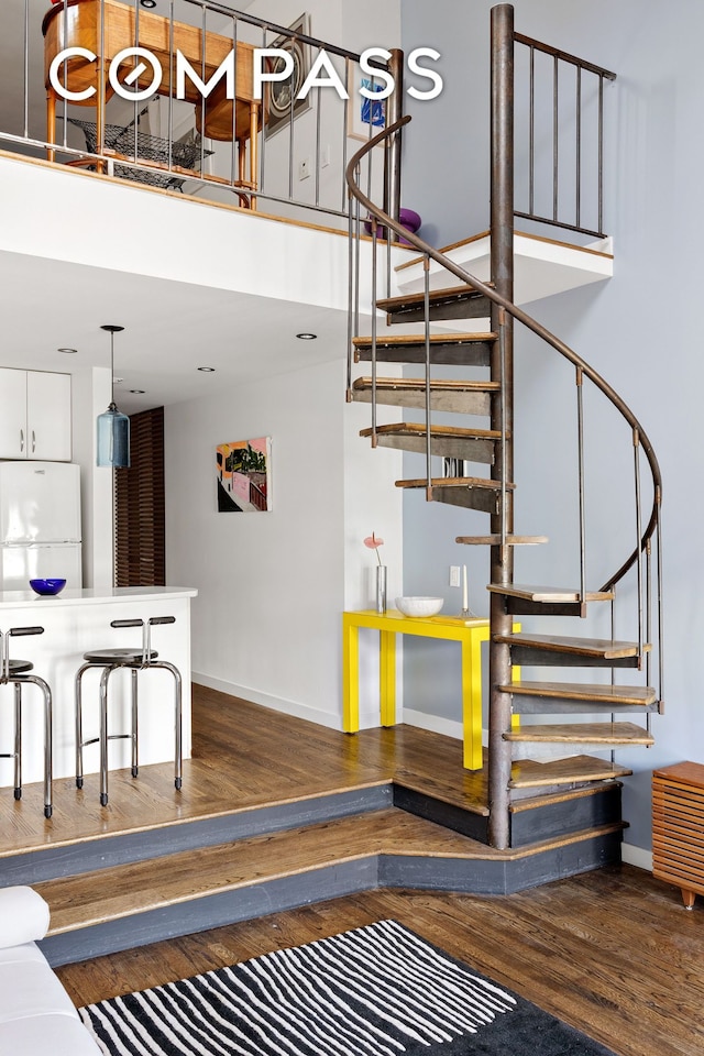 211 Thompson St Unit Ph6D, New York City, NY 10012 - stairs with wood finished floors