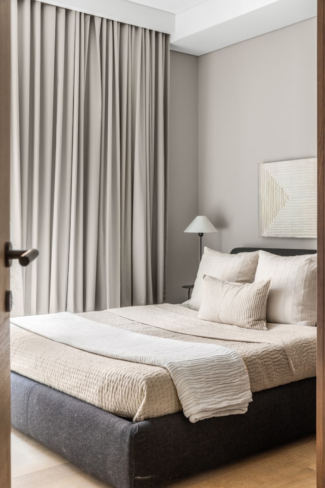 bedroom featuring light wood-style flooring