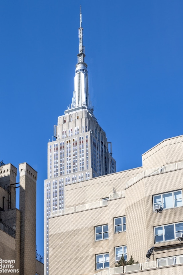 view of building exterior featuring a city view