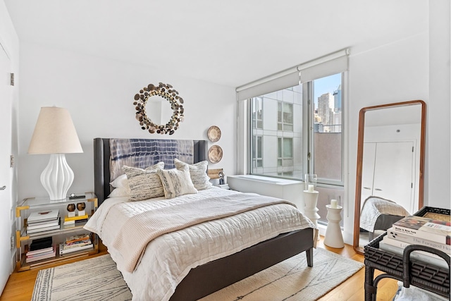 bedroom with light wood-style flooring