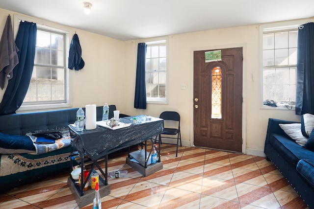 tiled home office featuring baseboards