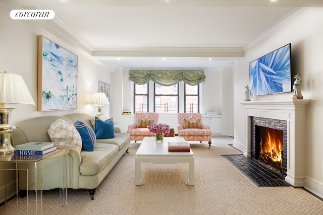 carpeted living area featuring baseboards, a fireplace with flush hearth, visible vents, and crown molding