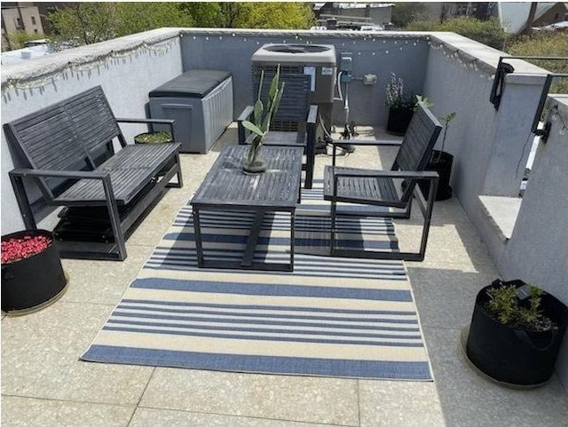 577 Madison St Unit 4B, New York City, NY 11221 - view of patio with central air condition unit