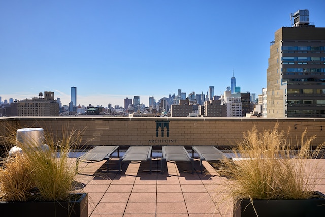 view of patio featuring a skyline view