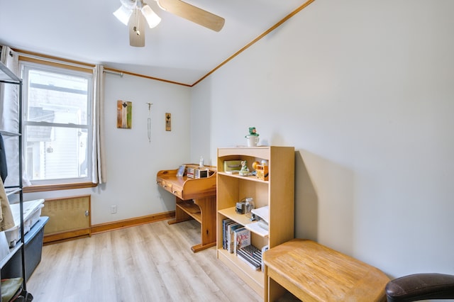 bedroom with ornamental molding, wood finished floors, a ceiling fan, and baseboards