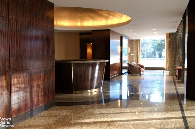 44 W 62nd St Unit 6E, New York City, NY 10023 - welcome area with a bar and recessed lighting