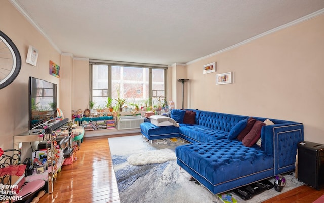 living room featuring expansive windows, wood-type flooring, and crown molding