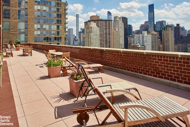 view of patio / terrace with a view of city