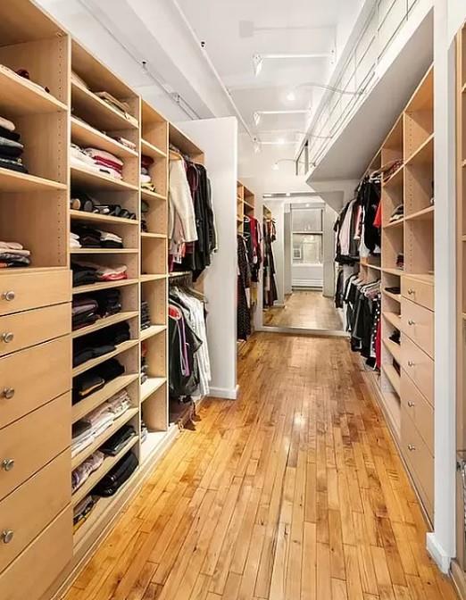 spacious closet with light wood-style floors