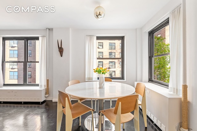 dining room featuring baseboards