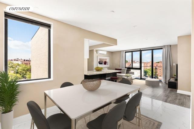 dining room featuring marble finish floor, visible vents, floor to ceiling windows, and baseboards