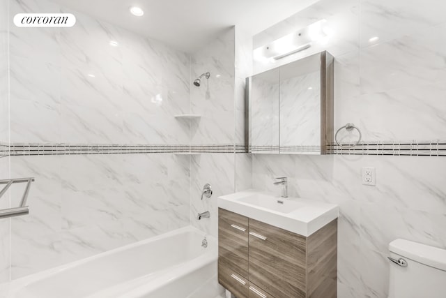 full bathroom with toilet, washtub / shower combination, visible vents, and vanity