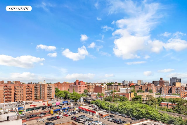 drone / aerial view featuring a city view