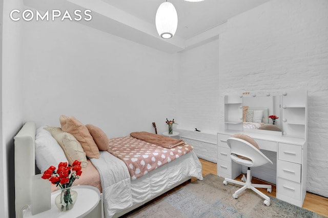 bedroom featuring light wood-type flooring