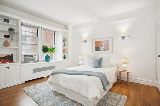 17 E 96th St Unit 5C, New York City, NY 10128 - interior space featuring light wood finished floors, baseboards, and a notable chandelier