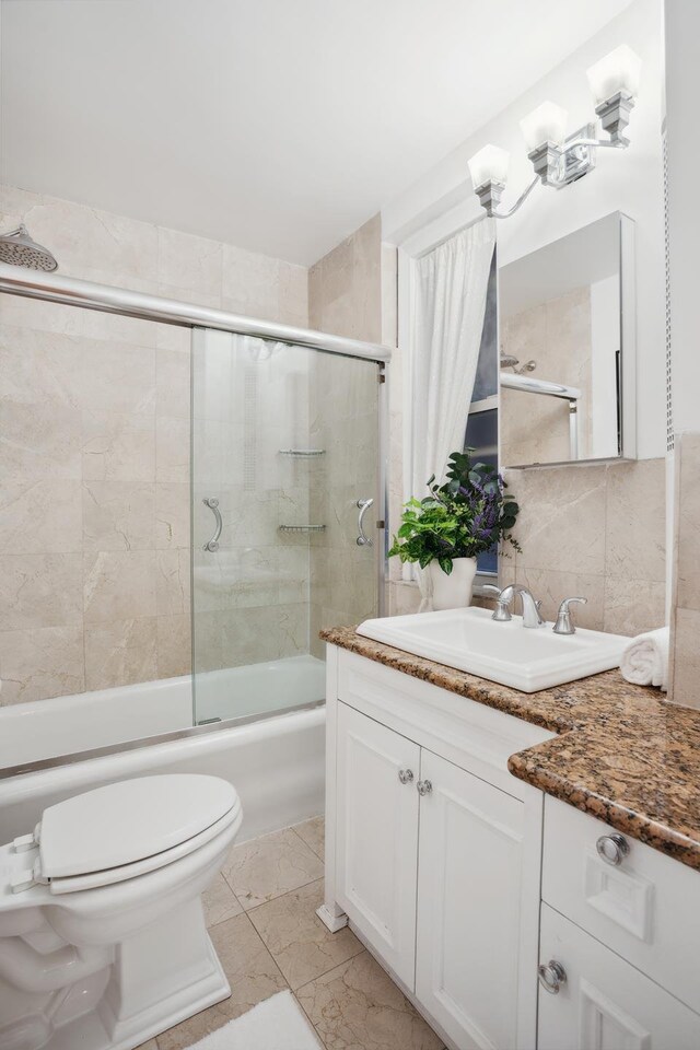 17 E 96th St Unit 5C, New York City, NY 10128 - kitchen featuring dark wood-style floors, white appliances, baseboards, tasteful backsplash, and white cabinetry
