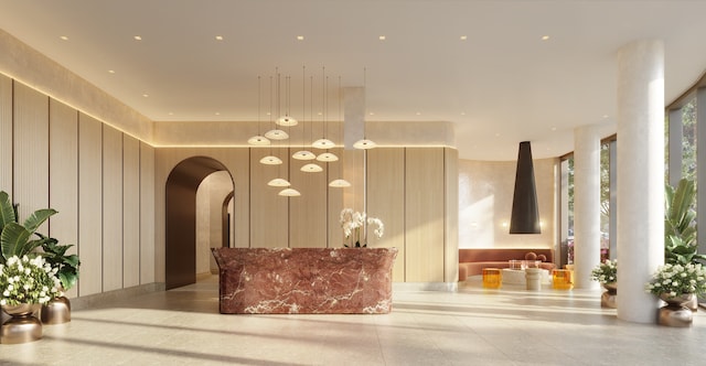 reception area featuring arched walkways