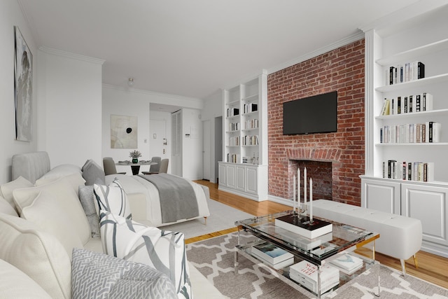 bedroom with light wood finished floors, a brick fireplace, and crown molding