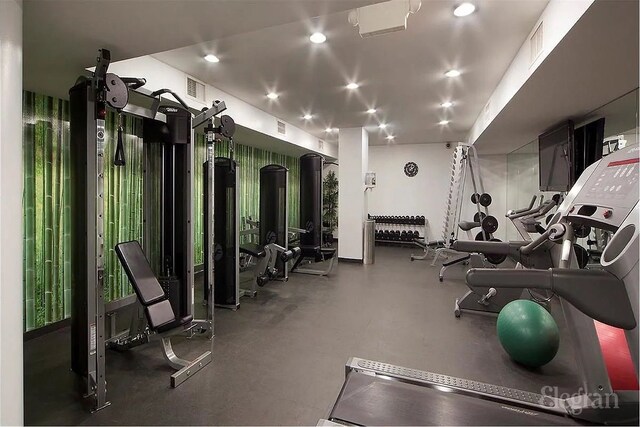 100 W 58th St Unit 2-A, New York City, NY 10019 - workout area with visible vents and recessed lighting