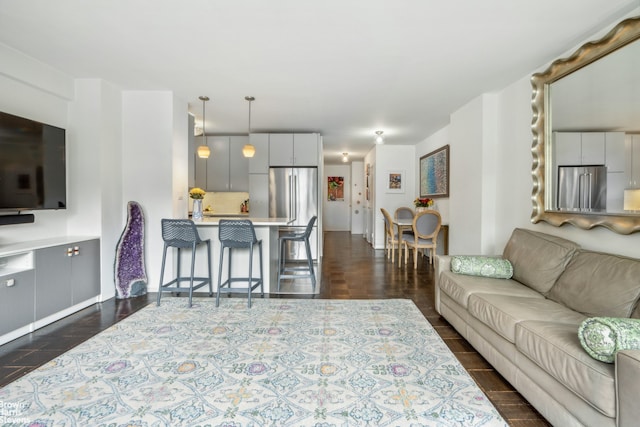 living room with dark wood-style flooring