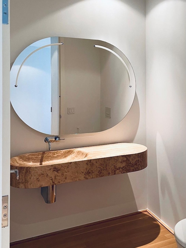 bathroom featuring wood finished floors