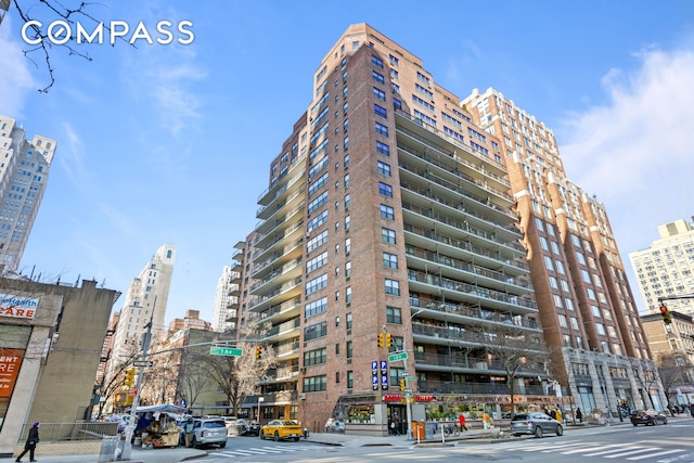 view of building exterior featuring a city view