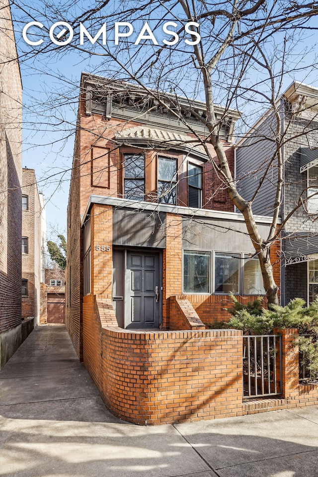 view of front facade with brick siding