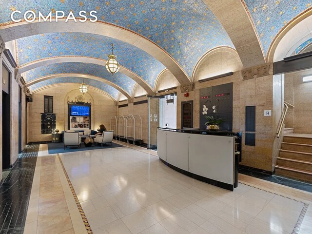 1 Hanson Pl Unit 15M, New York City, NY 11243 - reception featuring high vaulted ceiling and stairs