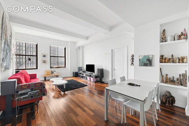 1 Hanson Pl Unit 15M, New York City, NY 11243 - living area with wood-type flooring and beam ceiling