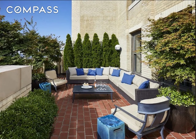 view of patio featuring outdoor lounge area and fence