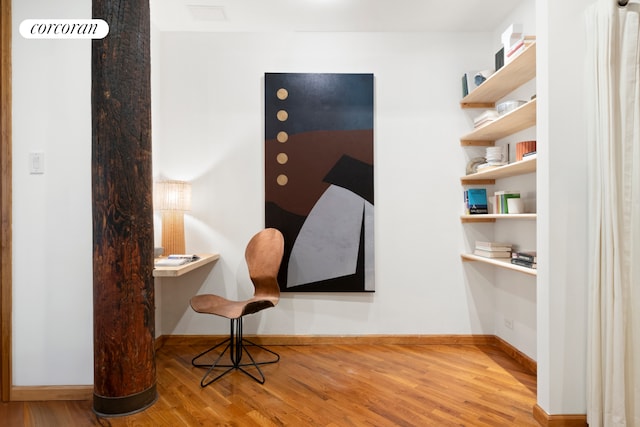 office with wood finished floors and baseboards