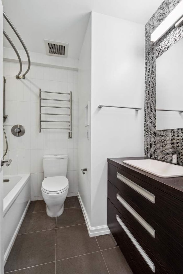 full bathroom featuring radiator heating unit, tile patterned floors, vanity, and visible vents