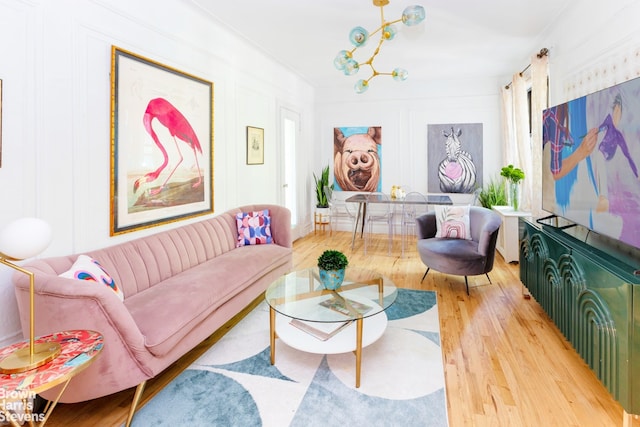 living room featuring light wood finished floors and a wealth of natural light